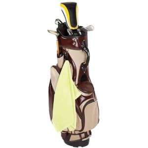 A bamboo golf towel in light green hangs from a brown golf bag with various clubs visible on top.