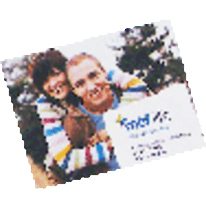 A fridge magnet featuring a colourful design with two smiling individuals, showcasing vivid hues and a glossy finish.