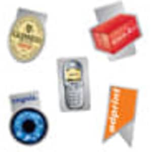 A collection of magnets featuring various designs, including a logo, a drink can, a mobile phone, and a decorative flag.