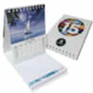 A compact, multi-coloured desk calendar with a ring binding and an image of a sailboat. It includes a notepad section.