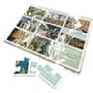 A5 cardboard jigsaw featuring multiple scenic images in soft colours, with several puzzle pieces displayed beside it.