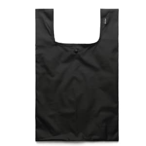A black reusable grocery bag with a wide opening and a button closure, featuring a logo.