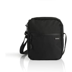 A black recycled transit bag with a front zippered pocket and an adjustable shoulder strap. It features a logo.