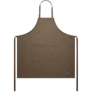 A brown canvas apron with a pocket and waist ties, featuring a branding logo.