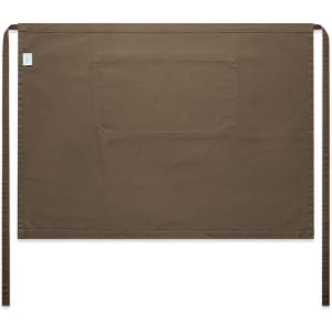 A brown canvas half apron featuring a large front pocket and ties on either side. It has a logo displayed.