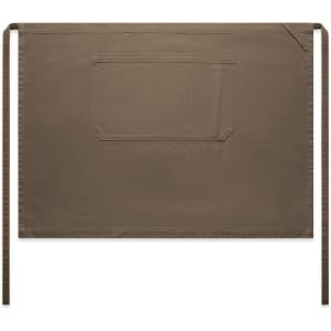 A brown canvas half apron featuring a large pocket and tie straps on both sides.