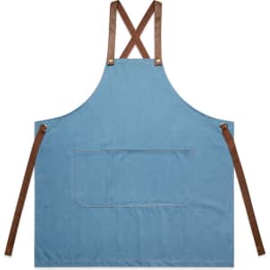A denim apron in blue with brown straps and a front pocket, featuring a logo.