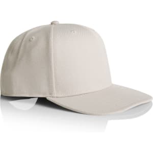 A cream-coloured cap with a curved brim and stitched detailing, featuring a logo on the front.