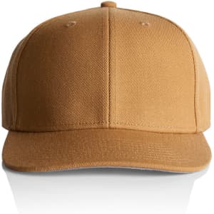 A tan cap with a structured front and a curved visor, featuring a branding logo on the side.
