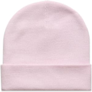 A light pink cuff beanie with a folded brim and a subtle logo.