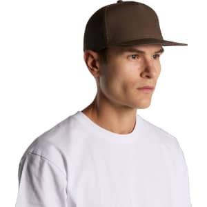 A brown trucker cap with a flat brim and mesh back, worn by a man in a white T-shirt.