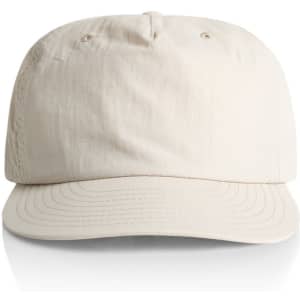 A beige cap featuring a rounded crown and a curved brim, with a logo on the front.