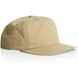 A beige cap with a curved brim and a top button, featuring a logo on the front.