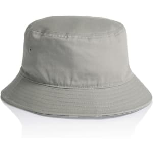 A grey bucket hat with a wide brim and a single ventilation hole, featuring a logo on the side.
