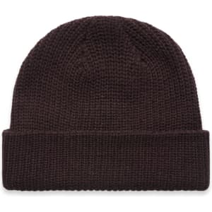 A brown knitted beanie with a turned-up cuff and a logo on the side.