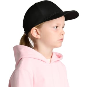 A black cap designed for kids, featuring a structured front and a curved brim, worn by a child in a pink hoodie.