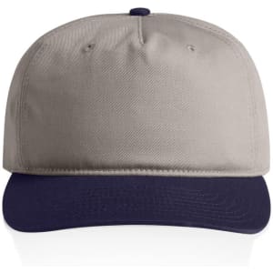 A two-tone cap featuring a beige crown and a navy brim, with a logo on the front.