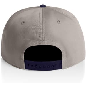 A two-tone cap featuring a light grey body and a navy blue peak. The cap has a rear adjustment strap and logo.