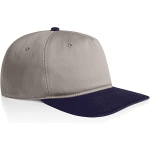 A two-tone cap featuring a beige crown and a navy blue visor, with a logo on the side.