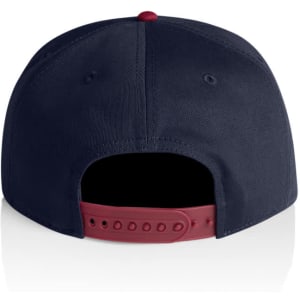 A two-tone cap featuring a navy blue body and a maroon accented brim, with an adjustable strap at the back.