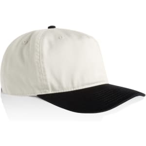 A two-tone cap featuring a cream crown and a black peak, with a logo on the front.