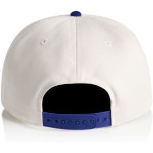 A two-tone cap featuring a white front and a blue back with an adjustable strap and a logo.