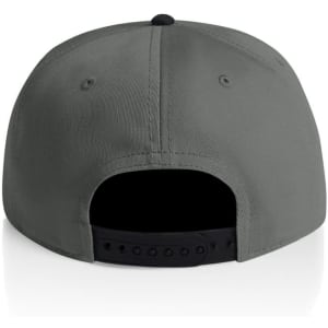 A two-tone cap in green and black with a logo on the back and an adjustable strap.