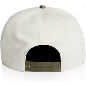 A two-tone camo cap featuring a khaki peak and white body. The back has an adjustable strap and a logo.