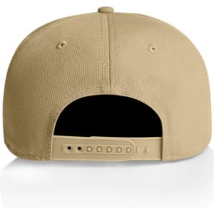 A tan cap with a snapback closure, featuring a smooth texture and ventilation holes. The inside is mostly black.
