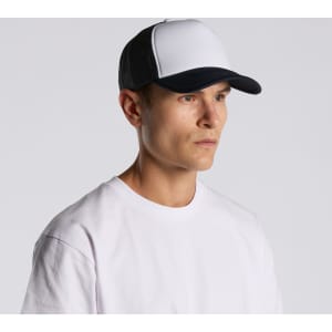 A two-tone trucker cap in white and black, featuring a mesh back and a solid front panel.