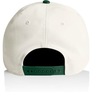 A two-tone cap featuring a cream exterior and a green adjustable strap at the back, with a logo present.