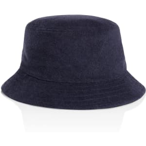 A navy terry bucket hat with a wide brim and soft texture, featuring a logo on the side.