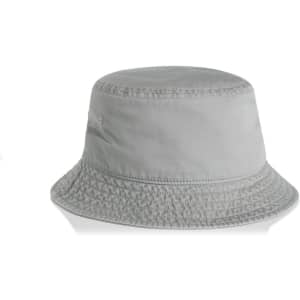 A faded grey bucket hat with a circular brim and a simple design. It features a logo on the side.