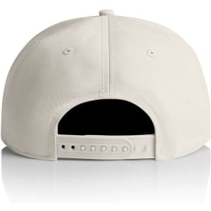 A beige 7-panel cap with a snapback closure and a logo on the back.