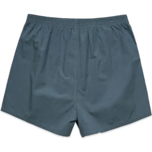 Boxer shorts in a deep teal colour with an elastic waistband and a simple design. Features a logo.