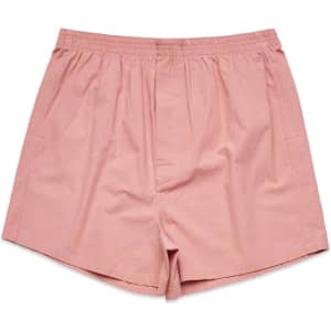 Light pink boxer shorts with an elasticised waistband, featuring a simple design and no patterns.