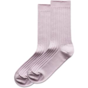 A pair of light pink ribbed socks displayed together, featuring a comfortable fit and a simple design.