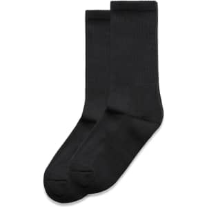 Two pairs of black socks with a ribbed cuff and a smooth finish, featuring a subtle logo.