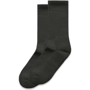 Two pairs of dark grey socks, featuring a simple ribbed design, laid flat against a white background.