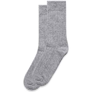 Two pairs of speckled grey socks in a ribbed pattern, displayed side by side.