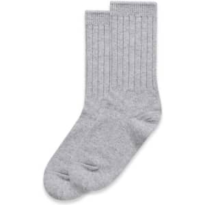 A pair of grey knit socks with ribbed texture, featuring a simple design and soft fabric.
