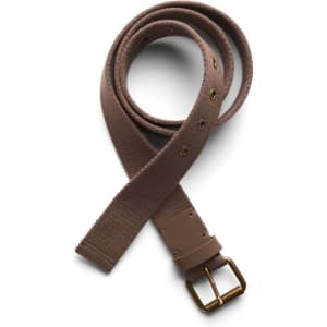 A brown cotton webbing belt with a gold buckle and adjustable holes. The belt is laid flat in a coiled position.