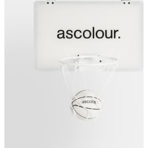 A mini basketball hoop set featuring a white backboard and a small basketball, both with branding.