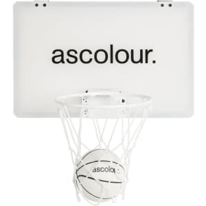 A mini basketball set featuring a white backboard, hoop, and a basketball with black detailing.