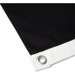 A black canvas flag featuring a white hem and grommet for secure hanging.