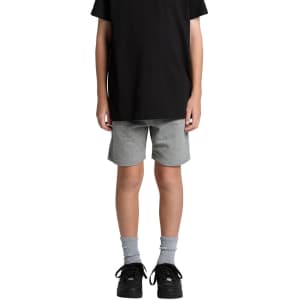 Youth stadium shorts in grey, displayed on a child wearing a black top and black shoes, with socks visible.