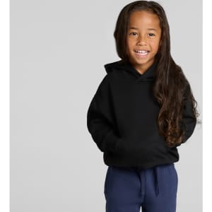 A child smiles while wearing a black hoodie. The hoodie features a front pocket and a hood.