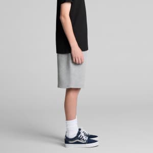 Youth Relax Track Shorts in grey, featuring a comfortable fit, paired with a black t-shirt and sneakers.