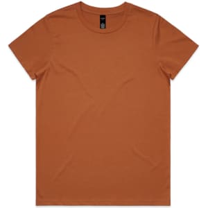 A plain t-shirt in a warm, earthy orange colour. It has a round neckline and a minimalist design.