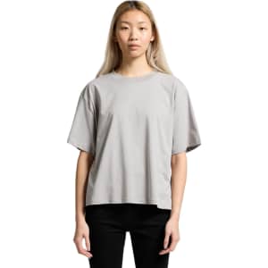 A grey t-shirt with a relaxed fit, featuring short sleeves and a simple design. It has a branding logo.